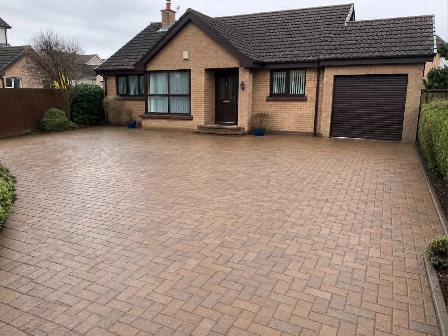 Clean block-paved driveway in Limavady after professional pressure washing